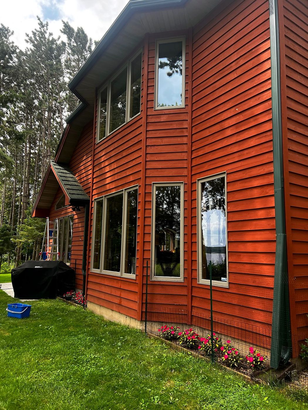 Two-story home window cleaning with ladder, Barron County, WI